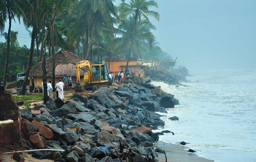 Temporary sea wall works in progress in Ullal